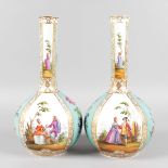 A PAIR OF AUGUSTUS REX PORCELAIN BOTTLE VASES, painted with four reverse panels of flowers and