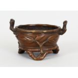 A SMALL 17TH/18TH CENTURY CHINESE BRONZE TRIPOD CENSER, weighing 190gm, the censer with bamboo-