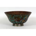 A 16TH CENTURY CHINESE MING DYNASTY CLOISONNE ENAMEL BOWL, supported on a splayed foot and with an