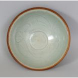 A CHINESE SONG/YUAN DYNASTY YINGQING PORCELAIN BOWL, the interior sketched beneath the glaze with