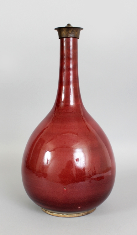 A CHINESE 18TH CENTURY SANG-DE-BOEUF PORCELAIN BOTTLE VASE, with a fixed bronze neck fitting, the - Image 2 of 6