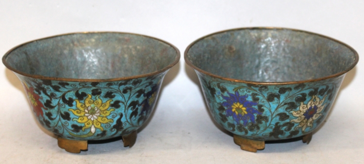 A PAIR OF 19TH CENTURY ORIENTAL MING STYLE CLOISONNE BOWLS, each decorated on a turquoise ground