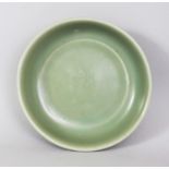 A CHINESE YUAN/MING DYNASTY LONGQUAN CELADON STONEWARE BOWL, with steep rounded sides, the