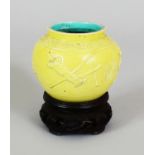 AN UNUSUAL 18TH/19TH CENTURY CHINESE YELLOW GLAZED MOULDED PORCELAIN JAR, together with a fitted