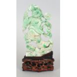 A 19TH/20TH CENTURY CHINESE APPLE-GREEN JADE FIGURE OF LIU HAI, together with a good quality fixed