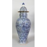 A LARGE CHINESE KANGXI PERIOD BLUE & WHITE PORCELAIN VASE & COVER, circa 1700, the sides with