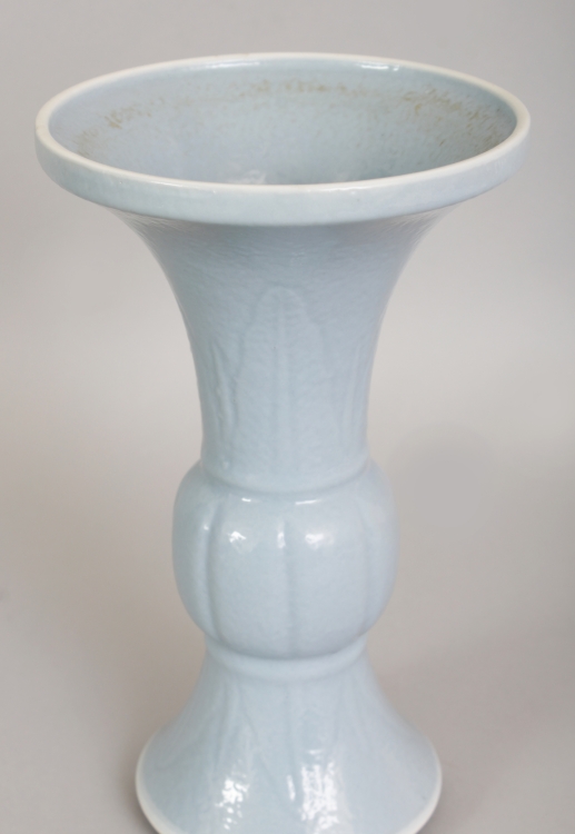 A 19TH CENTURY CHINESE CLAIRE-DE-LUNE PORCELAIN GU VASE, the sides moulded beneath the glaze with - Image 3 of 6