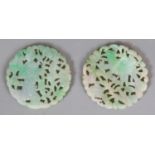 A PAIR OF EARLY/MID 20TH CENTURY CHINESE APPLE GREEN CIRCULAR JADE PLAQUES, one carved and pierced