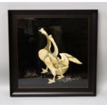 AN UNUSUAL FRAMED JAPANESE SILK EMBROIDERED PICTURE OF A PAIR OF GEESE, circa 1900, the decoration