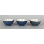 THREE CHINESE BLUE GLAZED PROVINCIAL PORCELAIN BOWLS, each 3.9in(10.1cm) diameter. (3). Found in