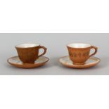 A NEAR PAIR OF 19TH/20TH CENTURY PARTIALLY GLAZED YIXING POTTERY TEA CUPS & SAUCERS, each piece