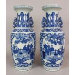 A GOOD LARGE MIRROR PAIR OF 19TH/20TH CENTURY CHINESE BLUE & WHITE PORCELAIN VASES, each painted
