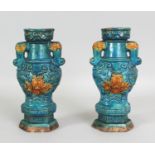 A PAIR OF CHINESE MING DYNASTY FAHUA STONEWARE VASES, each supported on a chamfered plinth, each