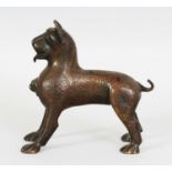 A PERSIAN QAJAR PERIOD ISLAMIC BRONZE MODEL OF A STANDING LION, standing four square, its body