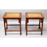 A GOOD PAIR OF 18TH/19TH CENTURY CHINESE HARDWOOD LOW TABLES, each with a rattan panel to its top