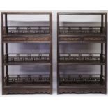 A GOOD PAIR OF LARGE CHINESE HARDWOOD STANDING OPEN DISPLAY SHELVES, very heavy in weight, each with