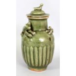 A RARE CHINESE SOUTHERN SONG DYNASTY LONGQUAN STONEWARE JAR & COVER, the shoulders moulded in high