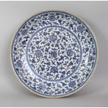 A LARGE CHINESE YONGZHENG PERIOD MING STYLE BLUE & WHITE PORCELAIN DISH, of saucer shape, the