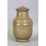 A CHINESE SOUTHERN SONG DYNASTY LONGQUAN CELADON STONEWARE FUNERARY JAR & COVER, with ribbed