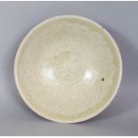 A CHINESE SONG DYNASTY CELADON PORCELAIN BOWL, possibly Yaozhou ware, the glaze of olive tone, the