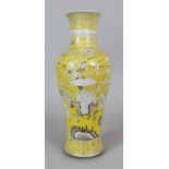 A GOOD 19TH CENTURY CHINESE YELLOW GROUND PORCELAIN VASE, decorated in white enamel with a