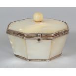 A MOTHER-OF-PEARL & SILVER-METAL OCTAGONAL BOX, with hinged cover, the panelled sides flaring