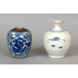 AN EARLY 18TH CENTURY CHINESE BLUE & WHITE PROVINCIAL PORCELAIN JAR, painted with scroll-stemmed