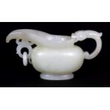 A CHINESE CELADON JADE LIKE ARCHAIC EWER, with a dragon handle and also a loose ring handle