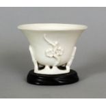 A 17TH/18TH CENTURY CHINESE DEHUA BLANC-DE-CHINE PORCELAIN LIBATION CUP, of oval section, together