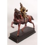 A GOOD JAPANESE MEIJI PERIOD MIYAO STYLE PARCEL GILT BRONZE MODEL OF A SAMURAI, riding a horse and