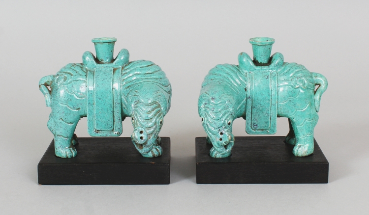 A MIRROR PAIR OF 18TH/19TH CENTURY CHINESE ROBIN'S EGG ELEPHANT CANDLE OR JOSS STICK HOLDERS,