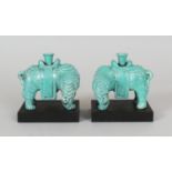 A MIRROR PAIR OF 18TH/19TH CENTURY CHINESE ROBIN'S EGG ELEPHANT CANDLE OR JOSS STICK HOLDERS,