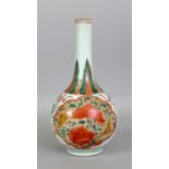 A 17TH/18TH CENTURY CHINESE WUCAI PORCELAIN BOTTLE VASE, painted with two barbed panels of lotus,