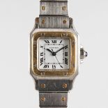 A LADIES CARTIER SANTOS WRISTWATCH, No. 090247872, automatic, stainless steel and gold.