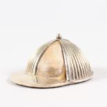 A GOOD THREE DIVISION JOCKEY CAP PIN CUSHION with leather base. Birmingham 1897. Maker: CS & FS.