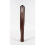 A RARE GILBERT ISLANDS CARVED WOOD CLOTH BEATER, four sided, the main side with crosshatch and other