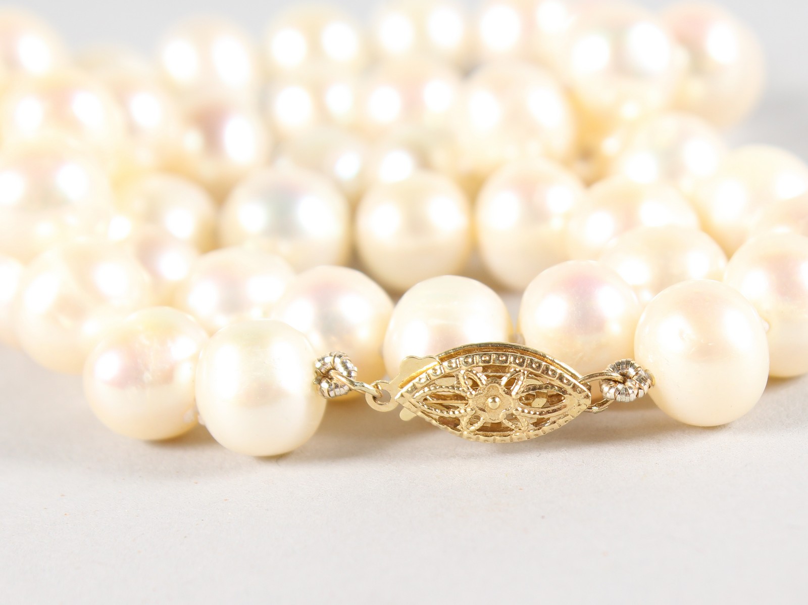 A STRING OF PEARLS with 14ct gold clasp. - Image 4 of 4