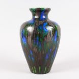 A MINTON AND HOLLINS & CO ART POTTERY VASE, blue splash decoration. Printed mark. 10.5ins high.