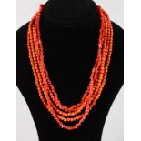 TWO SETS OF CORAL NECKLACES.