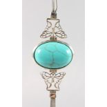 A TURQUOISE SILVER MOUNTED BRACELET.