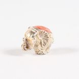 A MINIATURE ELEPHANT PIN CUSHION. London 1965. Maker: AN. 3cms long.