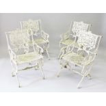 A SET OF FOUR PAINTED IRON GARDEN ARMCHAIRS.