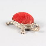 A CONTINENTAL SILVER TURTLE PIN CUSHION. 5.5cms long.