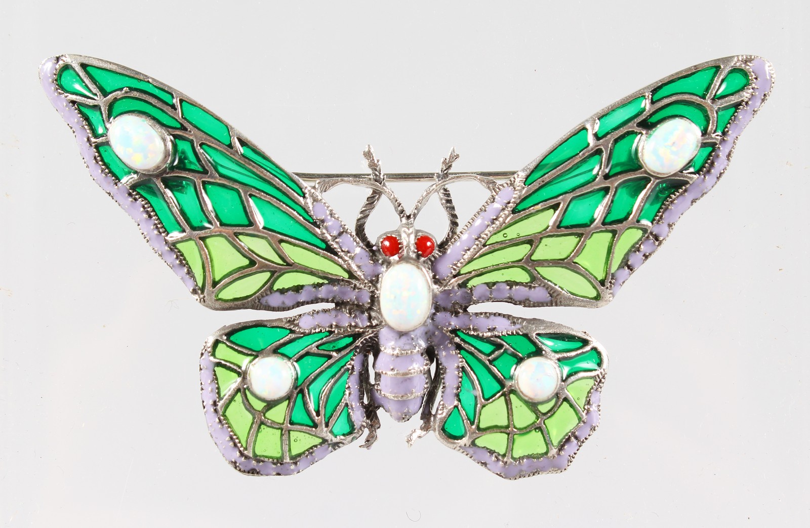 A SILVER AND ENAMEL BUTTERFLY BROOCH.