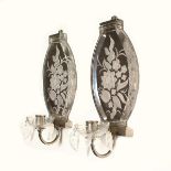 A PAIR OF ENGRAVED ART DECO DESIGN WALL SCONCES with candle holder and prism drops. 1ft long.