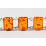 A SILVER AND AMBER BRACELET.
