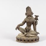 A SMALL CAST BRONZE CHINESE DEITY, seated cross legged on a lotus base. 8ins high.