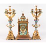 A SUPERB 19TH CENTURY FRENCH ISLAMIC DESIGN THREE PIECE CLOCK GARNITURE, the dial with eight-day