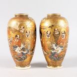 A PAIR OF JAPANESE SATSUMA VASES. 7ins high.