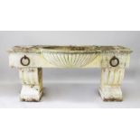 A LARGE PEDESTAL HORSE TROUGH, to imitate white marble, weathered and dirty, with shell water